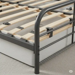 Twin size metal bed rails correctly installed and shown supporting a box spring, ready for a mattress.